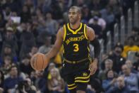 Golden State Warriors guard Chris Paul brings the ball up against the Detroit Pistons during the first half of an NBA basketball game in San Francisco, Friday, Jan. 5, 2024. (AP Photo/Jeff Chiu)