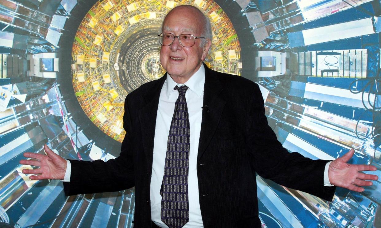 <span>Peter Higgs at the Collider exhibition at the Science Museum in London, 2013, presenting the work of the Cern laboratory in Geneva.</span><span>Photograph: Sean Dempsey/AP</span>