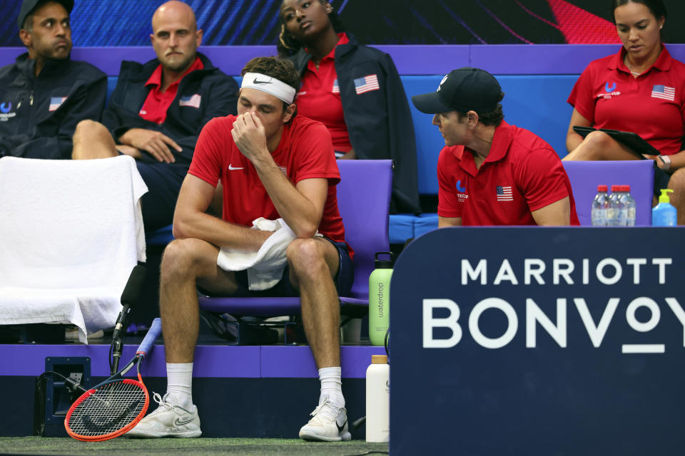 Taylor Fritz of the United States talks with team captain David Witt during a break in his match against Alex de Minaur of Australia at the United Cup tennis tournament in Perth, Australia, Monday, Jan. 1, 2024. (AP Photo/Trevor Collens)