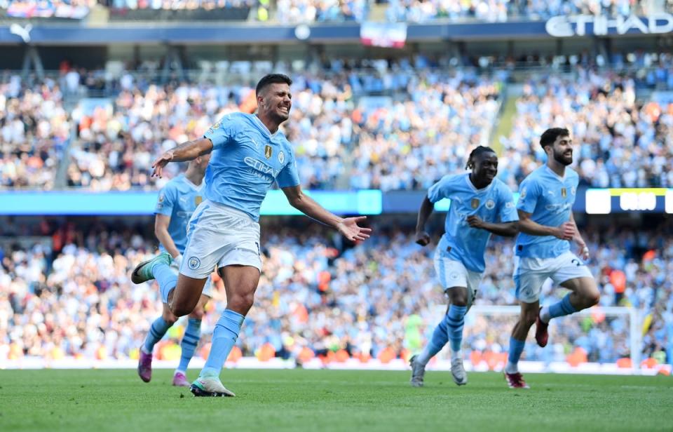 Rodri scores the third to wrap up the title (Getty Images)