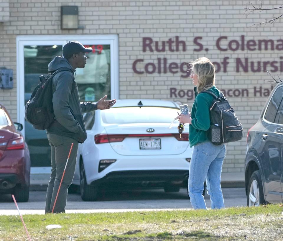 “I was shocked,” said Milton Davies (left), from Milwaukee, as he and and Erin Rasch, from Greendale, both senior nursing students talked about the schools closing outside the College of Nursing building before class at Cardinal Stritch University in Fox Point on Tuesday. “It’s very disappointing,” added Rasch. “I was supposed to graduate this December. Now I’m not really sure if that’s still going to be happening. So it is pretty disappointing.”