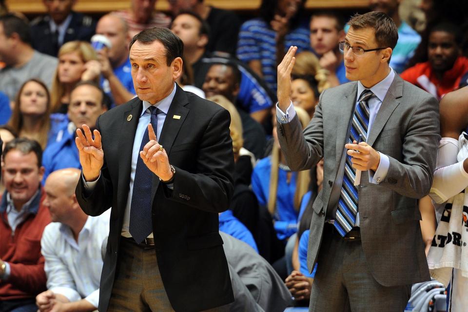 Head Coach Mike Krzyzewski and Assistant Coach Jon Scheyer of the Duke Blue Devils