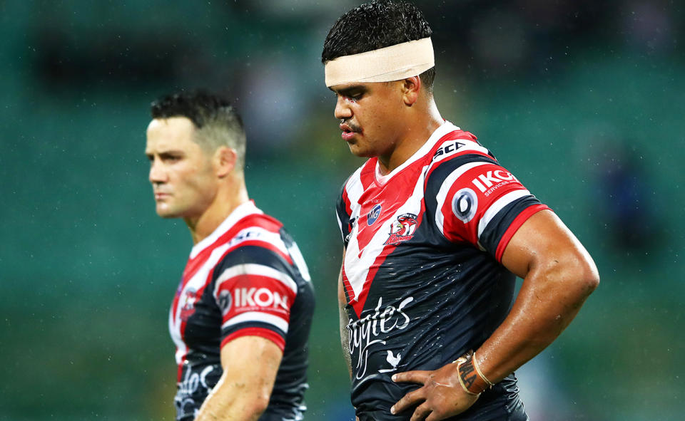 Cooper Cronk and Latrell Mitchell in 2019.