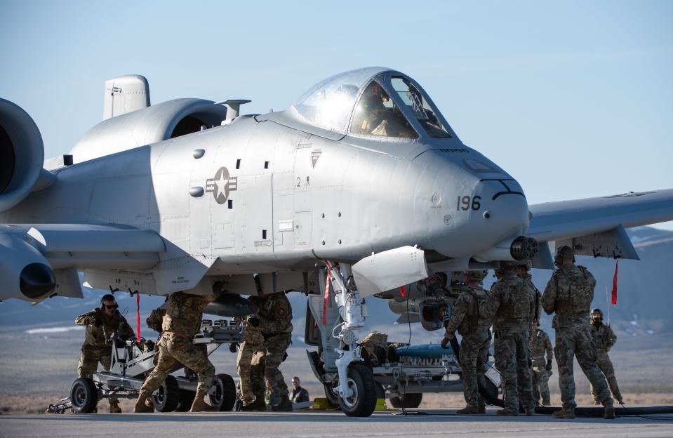 Airmen with the 127th Wing conduct an Integrated Combat Turn (ICT) weapons reload on an A-10 Thunderbolt II during Exercise Agile Chariot, near Rawlings, Wyoming, April 30, 2023.