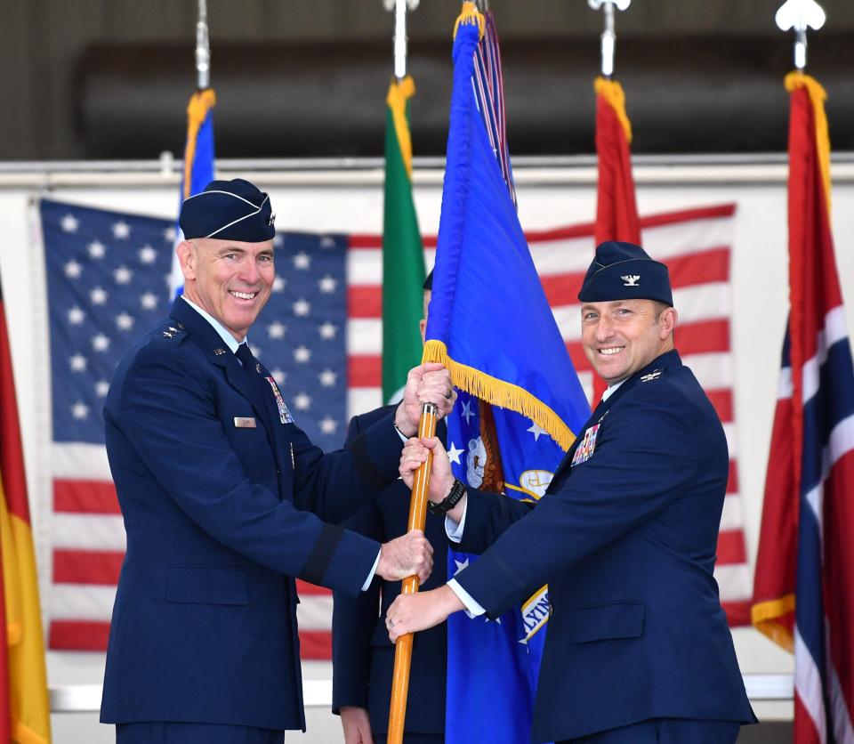 Col. Jeffrey D. Shulman (right) becomes the new commander of the 80th Flying Training Wing during the change of command ceremony on Wednesday at Sheppard Air Force Base.