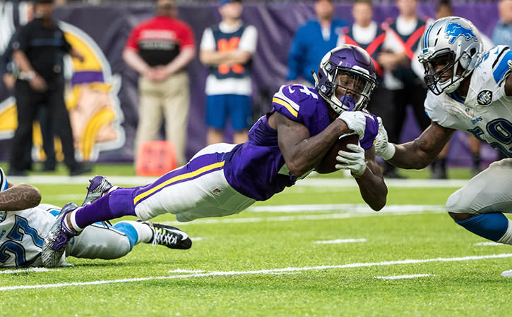Nov 6, 2016; Minneapolis, MN, USA; Minnesota Vikings wide receiver Stefon Diggs (14) dives for a first down during the fourth quarter against the Detroit Lions at U.S. Bank Stadium. The Lions defeated the Vikings 22-16.