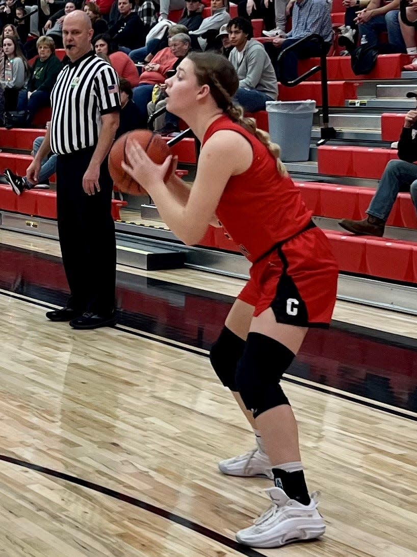 Cardington's Lydia Hess looks for a teammate during a girls basketball game at Pleasant last week.