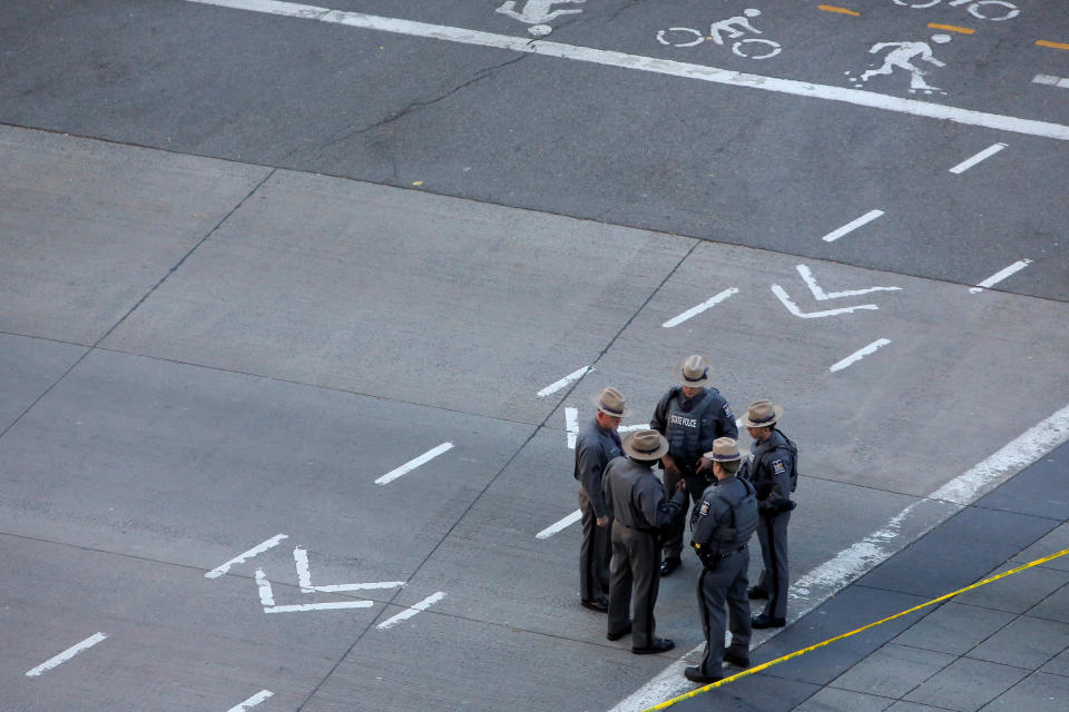 State Police stand near the scene of a pickup truck attack, on West Street in Manhattan, New York, U.S., October 31 2017.  REUTERS/Andrew Kelly