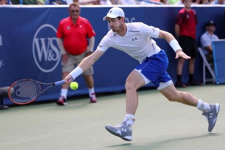 Aug 21, 2016; Mason, OH, USA; Andy Murray (GBR) returns a shot against Marin Cilic (CRO) in the finals during the Western and Southern tennis tournament at Linder Family Tennis Center. Mandatory Credit: Aaron Doster-USA TODAY Sports