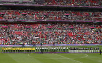 (L to R) Silver medallists Brazil, gold medallists Mexico and bronze medallists South Korea stand on the medal podiums during the soccer medal award ceremony at Wembley Stadium during the London 2012 Olympic Games August 11, 2012. REUTERS/Paul Hanna (BRITAIN - Tags: SPORT SOCCER OLYMPICS) 