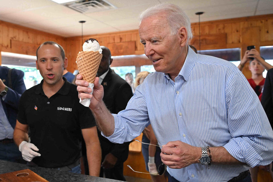 President Joe Biden eats ice cream at Moomers Homemade Ice Cream in Traverse City, Michigan on July 3, 2021.