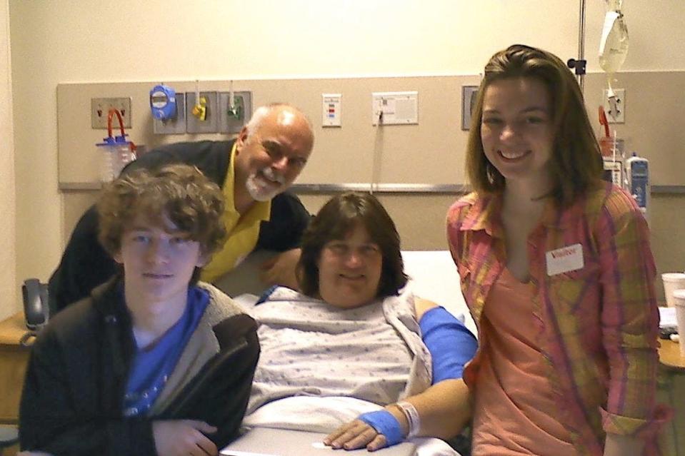 Mary Reed with her family, husband Tom McMahon, son Owen McMahon, and daughter Emma McMahon, just before she was released from the hospital after the Jan. 8, 2011, shooting.