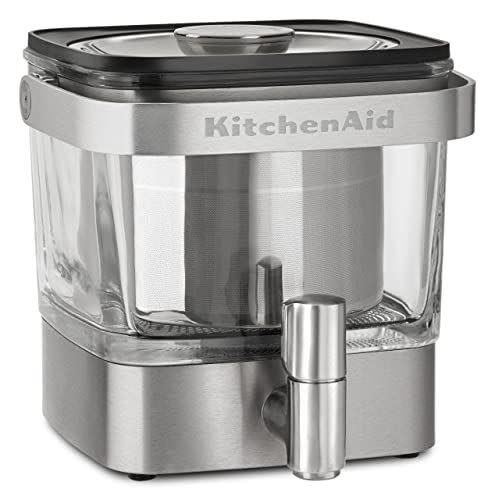 <p><strong>KitchenAid</strong></p><p>amazon.com</p><p><strong>$89.99</strong></p><p>The stainless steel and glass construction of this KitchenAid cold brew coffee maker gives it an elevated aesthetic — we think it looks great on the counter or in the refrigerator. Our testers found it exceptionally intuitive and easy to use. The users' guide includes illustrations, clear step-by-step instructions and recipes for using the concentrate. The lid has an oversized knob that allows you to lift it off with minimal effort, and the reservoir has a fill guideline for coffee, so you don't have to spend time measuring in another container. One caveat is that our tester found the fill line wasn't entirely precise — the measured grounds sat just above the line (which is a reminder to use a <a href="https://www.goodhousekeeping.com/cooking-tools/g39111517/best-kitchen-scales/" rel="nofollow noopener" target="_blank" data-ylk="slk:kitchen scale;elm:context_link;itc:0;sec:content-canvas" class="link ">kitchen scale</a> for exact results since all grounds can vary in size). </p><p> After 12 hours of steeping, the results were smooth and had good flavor. Our tester had no trouble using the spout, which had a moderate pace that was easy to control, and found the concentrate enjoyable over ice as well as with hot water. You can also use this pick for brewing tea. The unit isn't dishwasher safe, and it can be a little tricky to make sure you've reached all the crevices. </p>