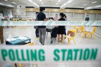 People vote in Singapore's general election amid Covid-19