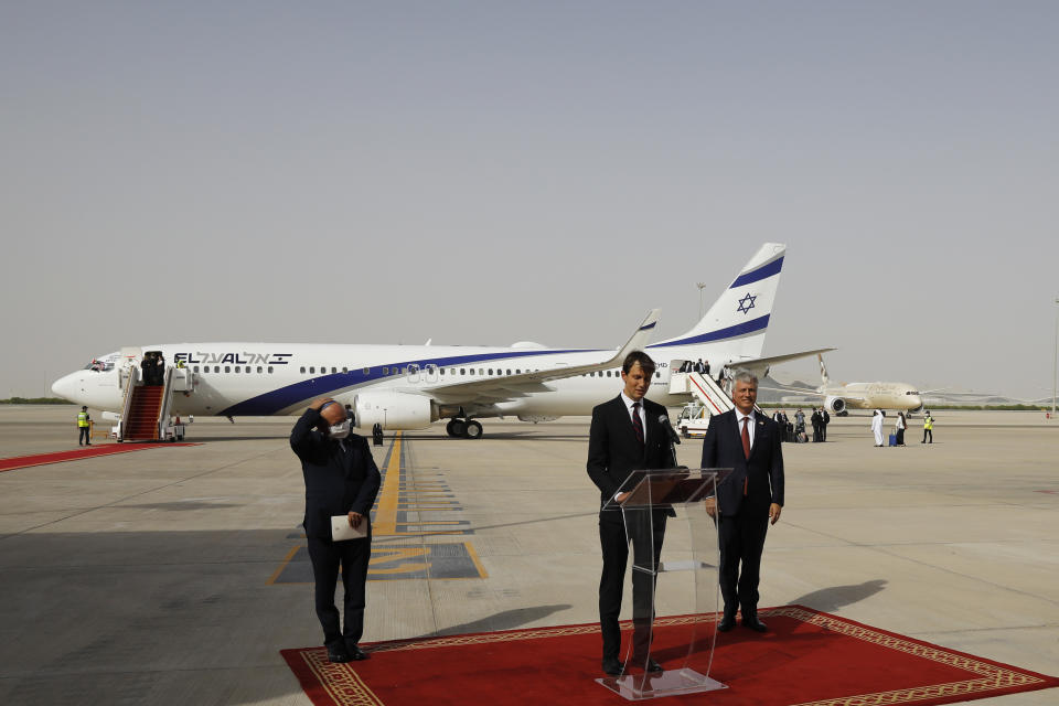 FILE - In this Aug. 31, 2020 file photo, U.S. President Donald Trump's senior adviser Jared Kushner, center, speaks as Israeli National Security Advisor Meir Ben-Shabbat, left, and U.S. National Security Advisor Robert O'Brien stand by after an El Al plane from Israel landed in Abu Dhabi, United Arab Emirates. For the first time in more than a quarter-century, a U.S. president will host a signing ceremony, Tuesday, Sept. 15, between Israelis and Arabs at the White House, billing it as an "historic breakthrough" in a region long known for its stubborn conflicts. (Nir Elias/Pool Photo via AP, File)