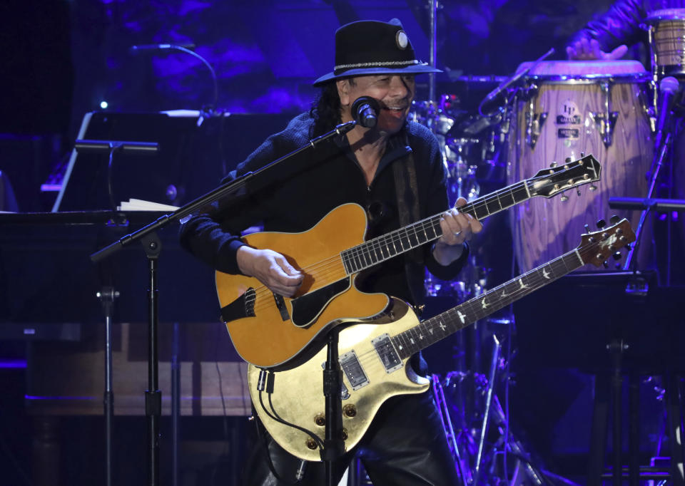 Santana performs on stage at the Pre-Grammy Gala And Salute To Industry Icons at the Beverly Hilton Hotel on Saturday, Jan. 25, 2020, in Beverly Hills, Calif. (Photo by Willy Sanjuan/Invision/AP)