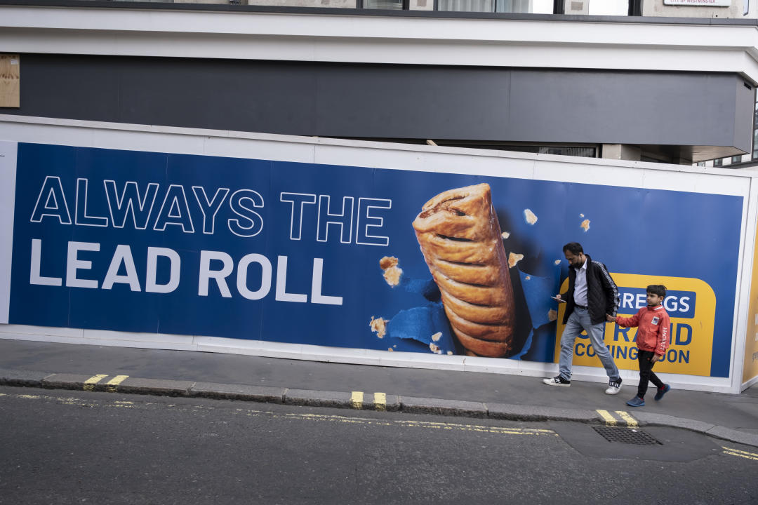 Hoarding depicting a giant sausage roll with the tagline 'Always the lead roll' outside a new Greggs shop on 10th April 2022 in London, United Kingdom. Greggs plc is a British bakery chain. It specialises in savoury products such as bakes, sausage rolls, sandwiches and sweet items. (photo by Mike Kemp/In Pictures via Getty Images)