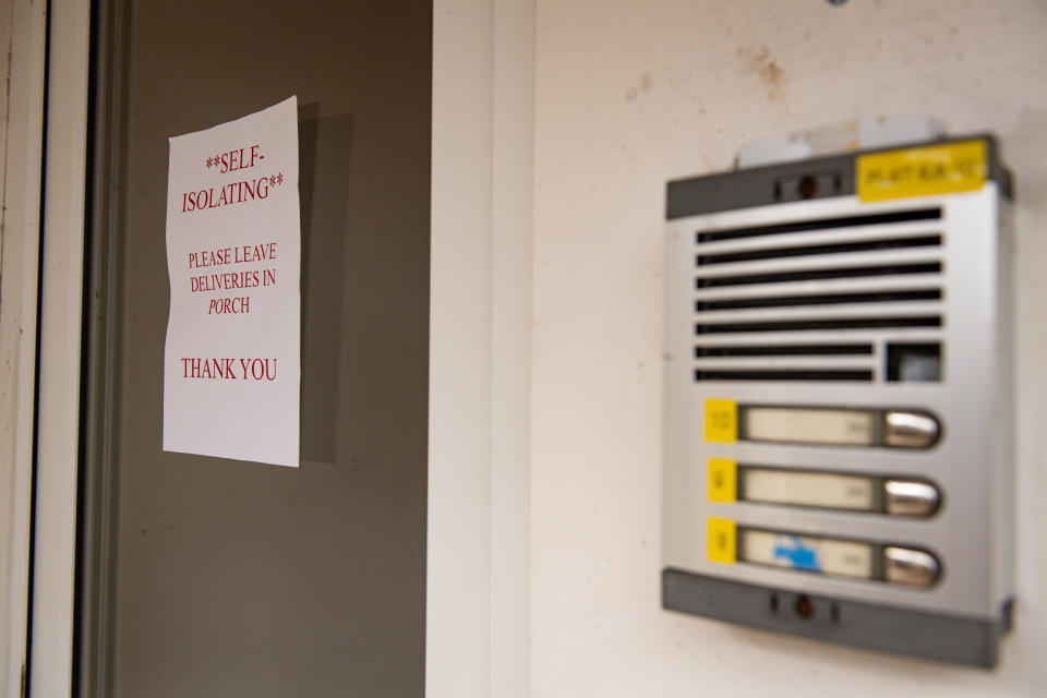 A stock photo of a self-isolation sign left outside a property, instructing where to leave deliveries, illustrating how self-isolating measures can be put in place. PA Photo. Picture date: Tuesday March 10, 2020. People with even minor respiratory tract infections or a fever could soon be asked to self-isolate as coronavirus continues to spread in the UK. See PA story HEALTH Coronavirus Isolation. Photo credit should read: Jacob King/PA Wire