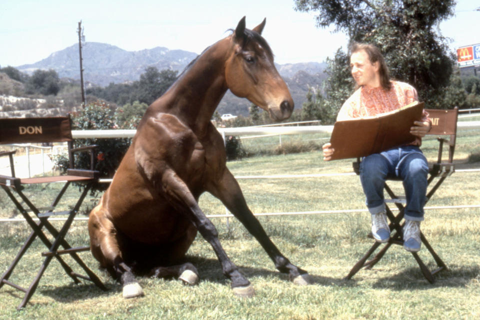 Goldthwait and his equine co-star in <em>Hot to Trot</em>. (Photo: Warner Bros./courtesy Everett Collection)