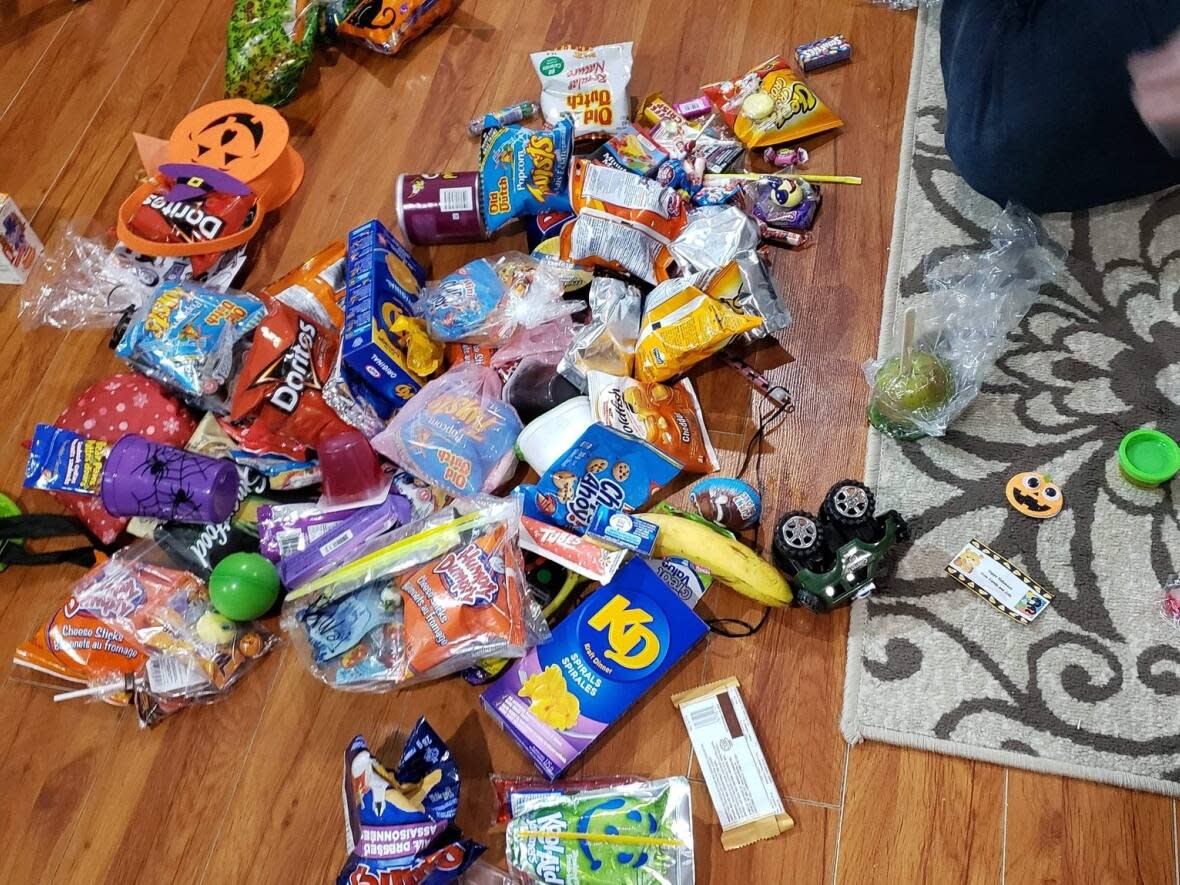 Many Halloween treats come in single-use plastic packaging. Environmentalists want trick or treaters to make sure the waste ends up in the proper place. (Submitted by Stephanie Martin to The Canadian Press - image credit)
