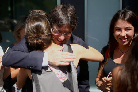 Former Catalan leader Carles Puigdemont is greeted by his supporters after a news conference in Berlin, Germany, July 25, 2018. REUTERS/Hannibal Hanschke