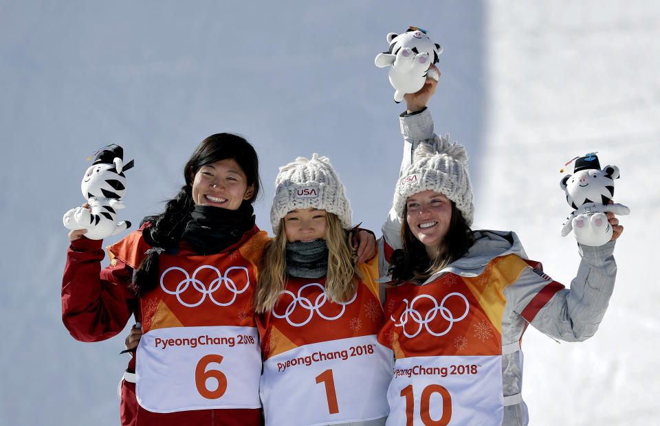 Chloe Kim, Liu Jiayu and Arielle Gold pose with their stuff animals after the women’s halfpipe. (AP Photo)