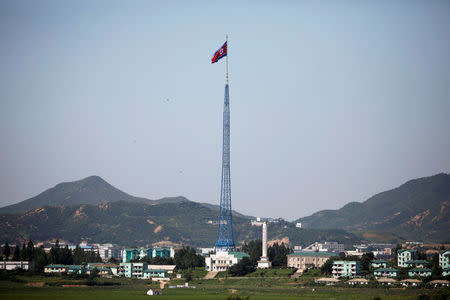 FILE PHOTO: A North Korean flag flutters on top of a tower at the propaganda village of Gijungdong in North Korea, in this picture taken near the truce village of Panmunjom, South Korea, August 26, 2017. REUTERS/Kim Hong-Ji/File Photo