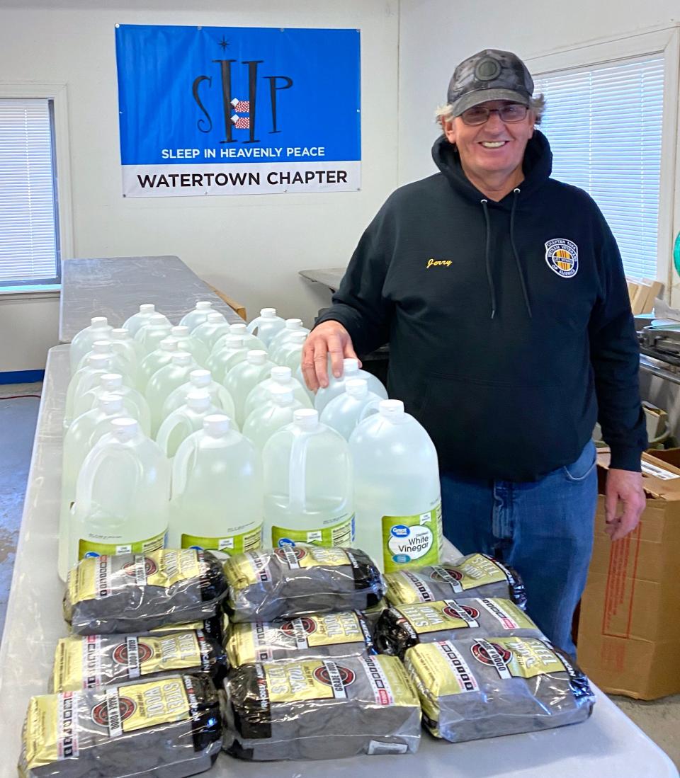 Jerry Denman from the Vietnam Veterans Chapter 1054 with their donation of vinegar and steel work to the Sleep in Heavenly Peace Watertown chapter.