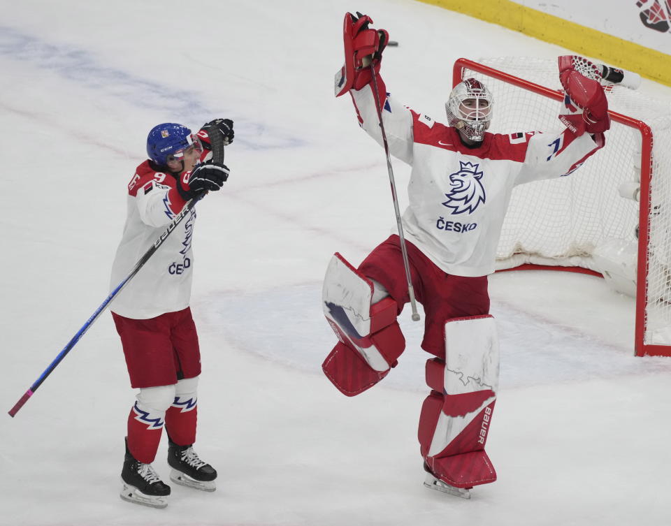 Czechia goaltender Michael Hrabal, right, and Tomas Hamara react following their win over Canada in a quarterfinal match at the IIHF World Junior Hockey Championship in Gothenburg, Sweden, Tuesday, Jan. 2, 2024. Christinne Muschi/The Canadian Press via AP)