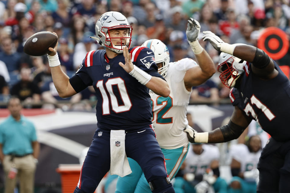 New England Patriots quarterback Mac Jones (10) looks to pass during the first half of an NFL football game against the Miami Dolphins, Sunday, Sept. 12, 2021, in Foxborough, Mass. (AP Photo/Winslow Townson)