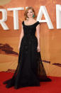 <p>While Kristen Wiig and Kate Mara were more dressed for a gray affair (in between black tie and casual), Jessica Chastain went all out for the London premiere of her new film. In an Elie Saab couture gown, the black piece was covered in bling and then she wore a pair of large emerald earrings that surely look painful but the smile on her face makes it all seem worth it. </p>