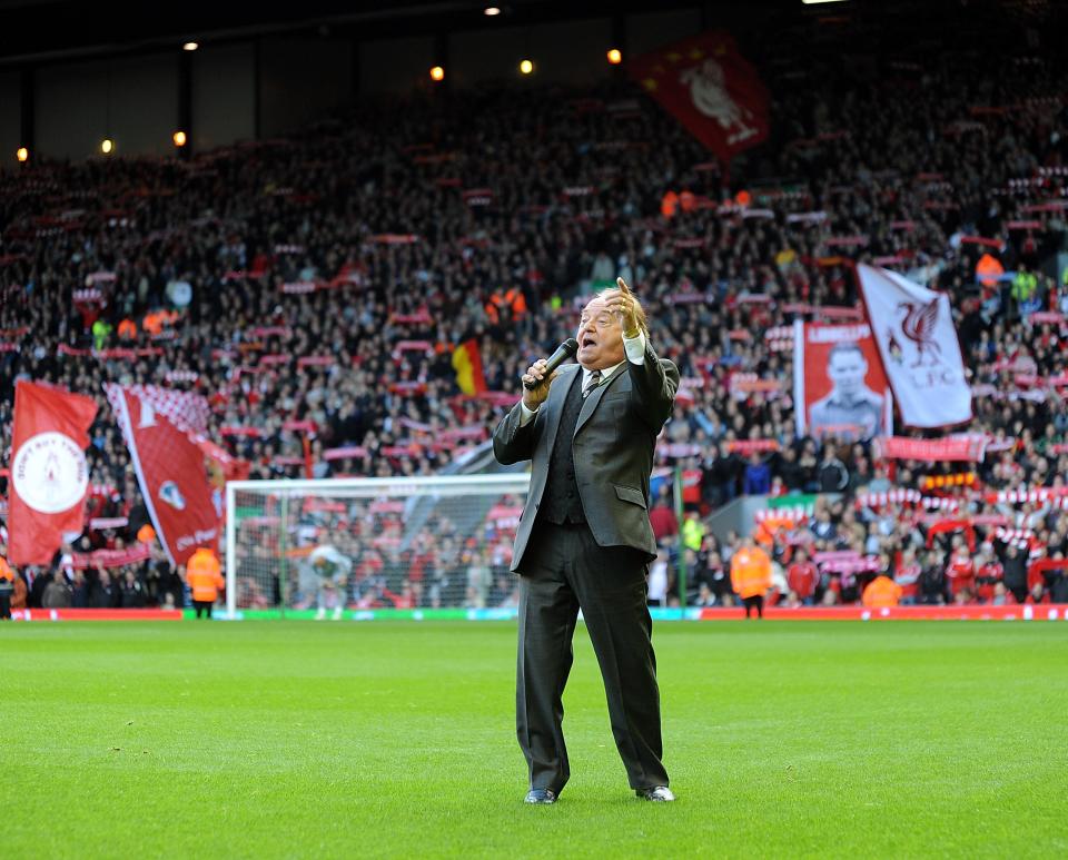 Marsden leads the Liverpool fans in a rendition of ‘You'll Never Walk Alone’ before their team’s league game against Blackburn Rovers at Anfield on 24 October 2010Liverpool FC/Getty