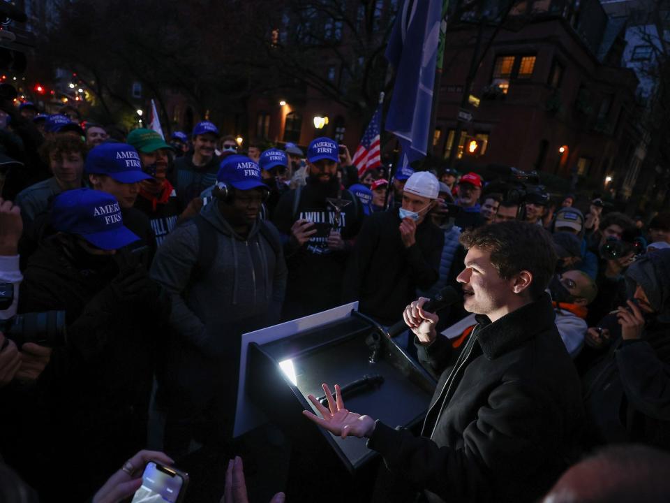 White supremacist Nick Fuentes speaks as America First protesters gather in front of the Gracie Mansion to protest vaccination mandates in New York City on November 13, 2021.