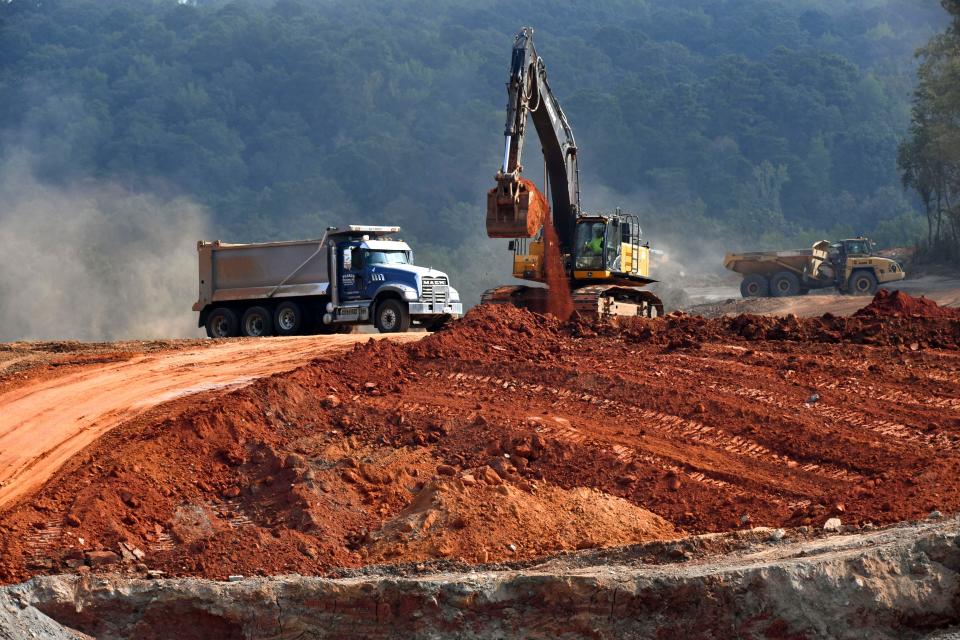 Road construction crews remove dirt at the site of the McWright’s Ferry Rd. Extension near where it will join the Eastern Northern Bypass at Rice Mine Rd. In Tuscaloosa Tuesday, Sept. 12, 2023.