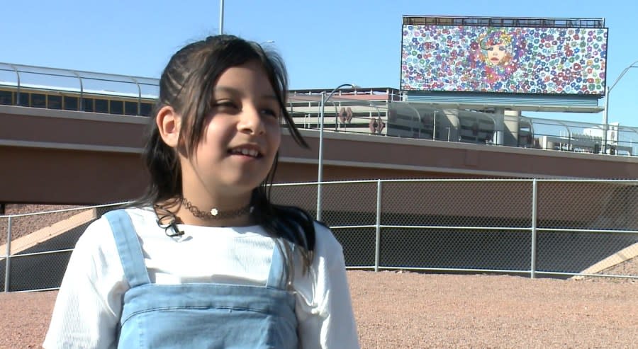 <em>Evelyn Hernandez is a student at Gene Ward Elementary School and was selected to feature her larger-than-life artwork of Mother Nature on a billboard located at Harry Reid International Airport. (Clark County)</em>