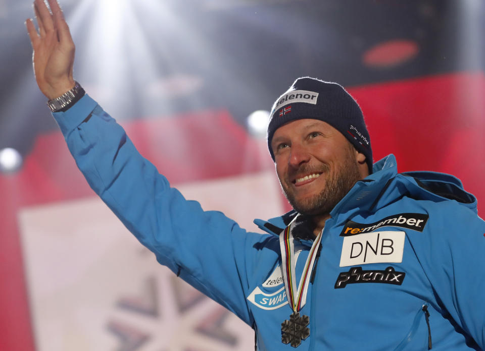 Silver medalist Norway's Aksel Lund Svindal poses during the medal ceremony for the men's downhill race, at the alpine ski World Championships in Are, Sweden, Saturday, Feb. 9, 2019. (AP Photo/Gabriele Facciotti)