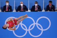 Sun Wei, of China, performs on the floor exercise during the artistic gymnastic men's team final at the 2020 Summer Olympics, Monday, July 26, 2021, in Tokyo. (AP Photo/Ashley Landis)