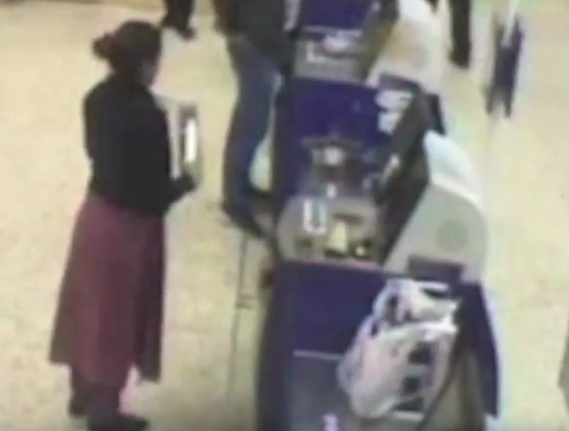 <em>Khan was caught on camera buying the knife she used in the ferocious attack (SWNS)</em>