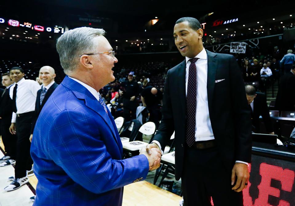 Missouri State Bears coach Dana Ford and Southern Illinois Salukis coach Barry Hinson shake hands before the two teams meet at JQH Arena on Wednesday, Feb. 6, 2019.