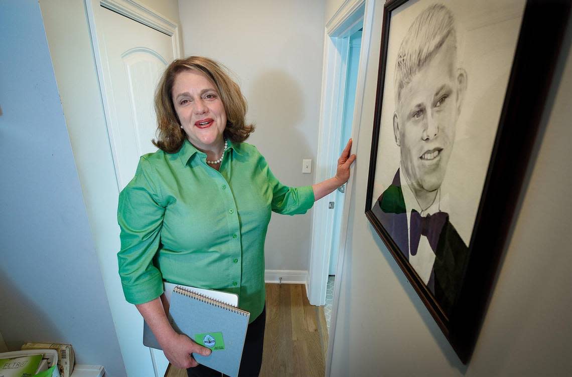 Sheila Albers continues to seek justice for her son, John Albers, 17, who was was shot and killed by Overland Park police officer Clayton Jenison during a welfare check at the family’s home in Overland Park in 2018. Albers seeks an investigation of Police Chief Frank Donchez. A friend of Albers’ created the portrait of John from a photo taken at a family wedding. Tammy Ljungblad/tljungblad@kcstar.com