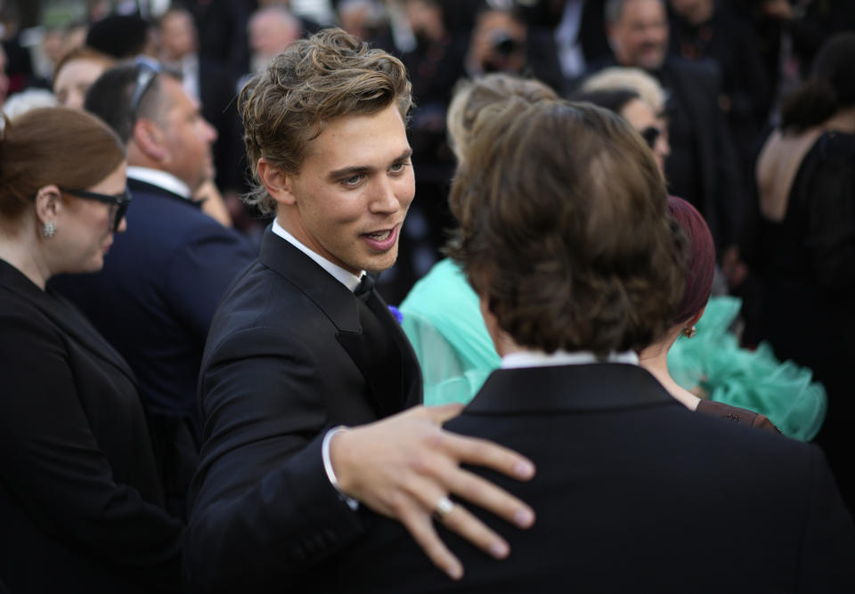 Austin Butler poses for photographers upon arrival at the premiere of the film 'Elvis' at the 75th international film festival, Cannes, southern France, Wednesday, May 25, 2022. (AP Photo/Daniel Cole)