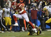 <p>Kansas City Chiefs tight end Travis Kelce (87) breaks a tackle by Pittsburgh Steelers defensive back Cortez Allen after making a reception during the first half of an NFL divisional playoff football game Sunday, Jan. 15, 2017, in Kansas City, Mo. (AP Photo/Ed Zurga) </p>