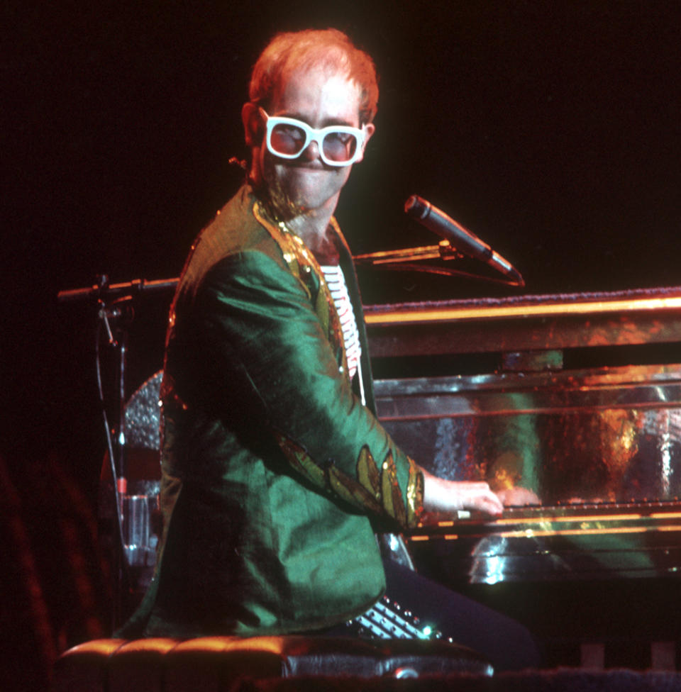 Elton John wearing white shades in 1974
