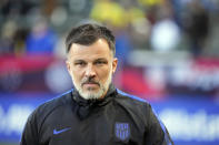 United States head coach Anthony Hudson walks on the pitch before an international friendly soccer match against Colombia, Saturday, Jan. 28, 2023, in Carson, Calif. (AP Photo/Marcio Jose Sanchez)