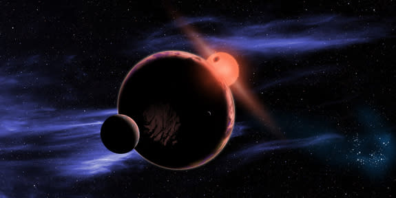 This artist’s conception shows a hypothetical habitable planet with two moons orbiting a red dwarf star. Astronomers have found that 6 percent of all red dwarf stars have an Earth-sized planet in the habitable zone, which is warm enough for liq