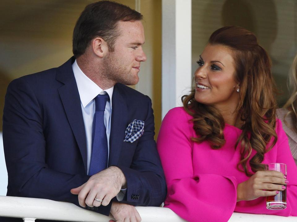 Coleen Rooney with husband Wayne Rooney (Dave Thompson/PA)