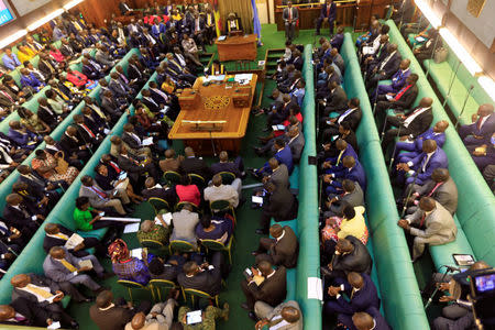 Ugandan lawmakers gather in the parliament to debate a move to change the constitution to extend the president's rule, in Kampala, Uganda September 21, 2017. REUTERS/James Akena