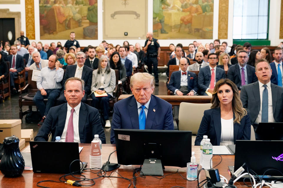 Donald Trump sits between his two lawyers during his trial at New York State Supreme Court. (Seth Wenig / AP Pool)