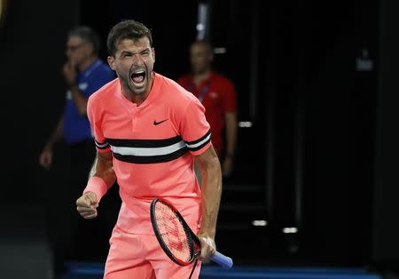 Tennis - Australian Open - Rod Laver Arena, Melbourne, Australia, January 17, 2018. Bulgaria's Grigor Dimitrov celebrates winning his match against Mackenzie McDonald of the U.S. REUTERS/Issei Kato