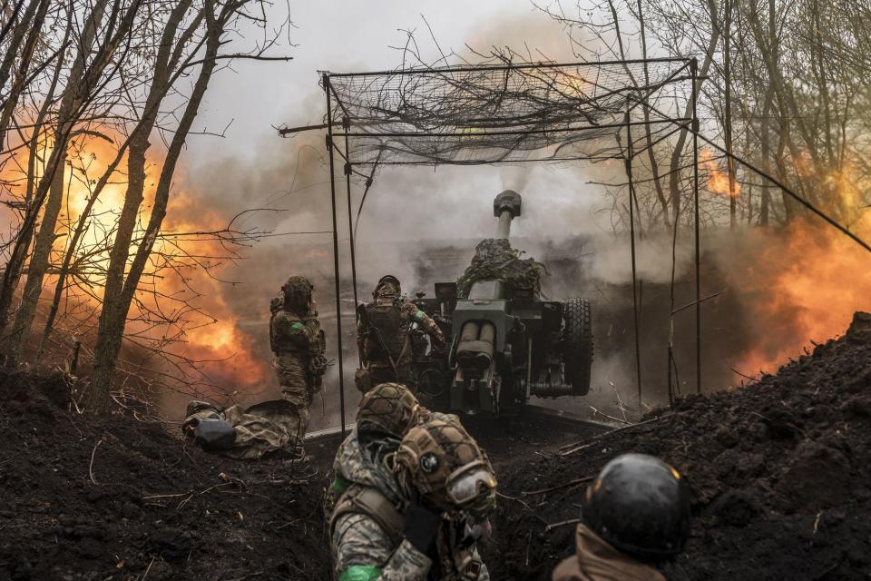 Ukrainian soldiers of the 80th brigade fire artillery in the direction of Russian positions in the temporarily occupied Bakhmut in Donetsk Oblast on April 13, 2023. (Photo by Diego Herrera Carcedo/Getty Images)